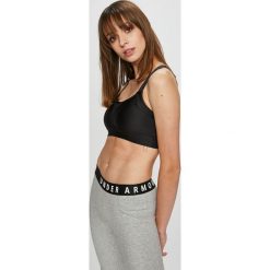 Under Armour - Biustonosz Sport. Czarne biustonosze sportowe damskie marki Under Armour, s, z elastanu. W wyprzedaży za 119,90 zł.