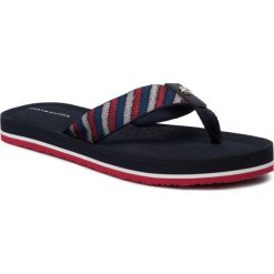 Japonki TOMMY HILFIGER Flat Beach Sandal Classic FW0FW04385. Niebieskie klapki damskie TOMMY HILFIGER, bez wzorów, bez obcasa. W wyprzedaży za 109,00 zł.