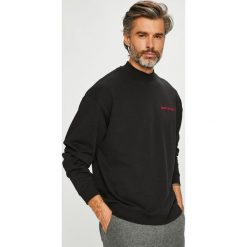 Calvin Klein Jeans - Bluza. Czarne bluzy męskie Calvin Klein Jeans, xl, bez wzorów, z bawełny, z okrągłym kołnierzem, bez rękawów, bez kaptura. W wyprzedaży za 299,90 zł.