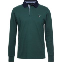 GANT THE ORIGINAL HEAVY RUGGER Koszulka polo june bug green. Zielone koszulki męskie GANT, s, bez wzorów, z bawełny, polo, z długim rękawem, długie. Za 379,00 zł.
