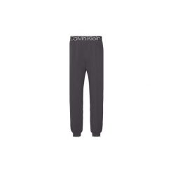 Spodnie treningowe Calvin Klein Jeans 000NM1563E JOGGER. Czarne spodnie męskie Calvin Klein Jeans, s, bez wzorów, z jeansu. Za 197,05 zł.