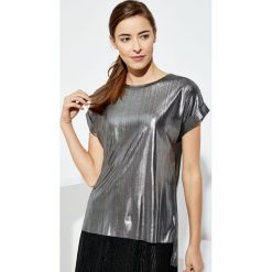 Bluzka oversize. Bluzki damskie Moodo, xs, bez wzorów, retro, bez kołnierzyka, bez rękawów. Za 9,99 zł.
