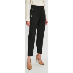 Calvin Klein - Spodnie. Czarne spodnie damskie Calvin Klein, z haftami, z poliesteru, eleganckie. W wyprzedaży za 339,90 zł.