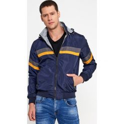 Granatowo-Żółta Dwustronna Kurtka Thessena. Niebieskie kurtki męskie Born2be, xl, bez wzorów, bez kaptura. Za 149,99 zł.