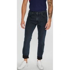 Wrangler - Jeansy. Niebieskie jeansy męskie Wrangler, bez wzorów. W wyprzedaży za 219,90 zł.