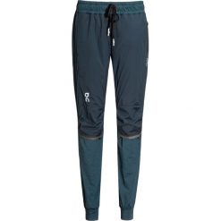Spodnie ON Running RUNNING-PANTS WOMAN. Szare spodnie damskie On Running, bez wzorów, z materiału. Za 750,00 zł.