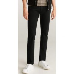 Mango Man - Jeansy Pisa. Żółte jeansy męskie Mango Man, l, bez wzorów. Za 139,99 zł.