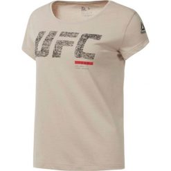 Reebok Koszulka Beżowy. Brązowe topy damskie Reebok, m, z nadrukiem, z bawełny. Za 137,95 zł.