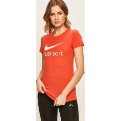 Nike Sportswear - T-shirt. Czarne topy damskie Nike Sportswear, s, z nadrukiem, z bawełny, z okrągłym kołnierzem. Za 119,90 zł.