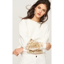 Bluzy damskie: Bluza z magicznymi cekinami – Kremowy