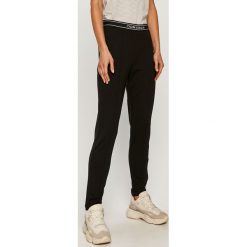 Calvin Klein Jeans - Spodnie. Czarne spodnie damskie Calvin Klein Jeans, s, z nadrukiem, z elastanu. Za 399,90 zł.