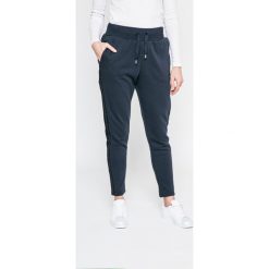 Adidas Originals - Spodnie. Niebieskie bryczesy damskie marki adidas Originals, z bawełny. W wyprzedaży za 159,90 zł.