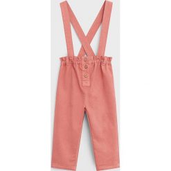 Mango Kids - Spodnie dziecięce Charlote 80-104 cm. Różowe spodnie dziewczęce Mango Kids, bez wzorów, z bawełny. Za 69,90 zł.
