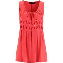 Długi top z błyszczącymi kamieniami bonprix koralowy. Czerwone topy damskie bonprix, bez wzorów, bez kołnierzyka. Za 34,99 zł.