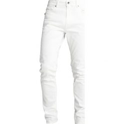 Tiger of Sweden Jeans EVOLVE Jeansy Slim Fit white. Białe jeansy męskie relaxed fit marki Tiger of Sweden Jeans. W wyprzedaży za 356,85 zł.