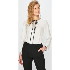 Answear - Bluzka Orient Express. Białe bluzki damskie ANSWEAR, s, bez wzorów, z wiskozy, casualowe, bez kołnierzyka, bez rękawów. Za 119,90 zł.