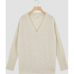 Sweter w kolorze kremowym. Białe swetry damskie Rodier, xl, bez wzorów, z wełny, klasyczne, bez rękawów, bez kaptura. W wyprzedaży za 242,95 zł.