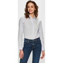 Tommy Hilfiger - Koszula. Niebieskie bluzki damskie TOMMY HILFIGER, na co dzień, w paski, z bawełny, casualowe, bez kołnierzyka, z długim rękawem. Za 359,90 zł.