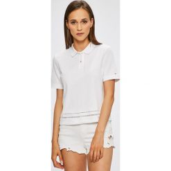 Tommy Hilfiger - Top. Białe bluzki damskie marki TOMMY HILFIGER, s, z elastanu, casualowe, z krótkim rękawem. W wyprzedaży za 199,90 zł.