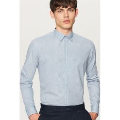 Koszula z podwijanymi rękawami slim fit - Turkusowy. Niebieskie koszule męskie slim marki Reserved, s. W wyprzedaży za 59,99 zł.