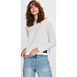 Calvin Klein Jeans - Bluzka. Białe bluzki damskie Calvin Klein Jeans, s, bez wzorów, z bawełny, z okrągłym kołnierzem. W wyprzedaży za 139,90 zł.