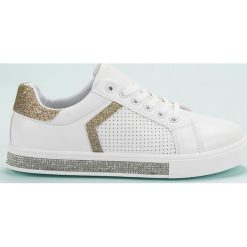 Ideal Shoes białe Buty Sportowe Z Cyrkoniami. Białe buty sportowe damskie Ideal Shoes, bez wzorów, z tkaniny, sportowe. Za 79,00 zł.