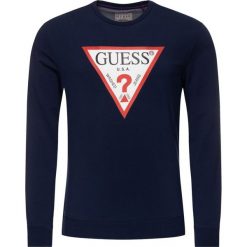 Bluza Guess Fleece M93Q22 K6ZS0. Szare bluzy męskie Guess, m, z aplikacjami, bez kołnierzyka, bez rękawów, bez kaptura. W wyprzedaży za 219,00 zł.