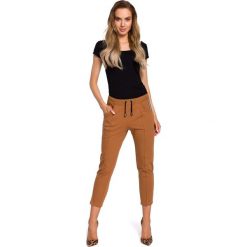 Kamelowe Dresowe Spodnie 7/8 z Lampasem. Pomarańczowe spodnie damskie Molly.pl, s, z wiskozy. Za 125,90 zł.
