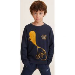 Mango Kids - Bluza dziecięca Cheap 110-164 cm. Niebieskie bluzy chłopięce Mango Kids, z nadrukiem, z bawełny, bez rękawów, bez kaptura. Za 49,90 zł.