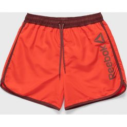 Reebok - Szorty. Czerwone spodenki sportowe męskie Reebok, s, bez wzorów, z poliesteru, sportowe. W wyprzedaży za 99,90 zł.