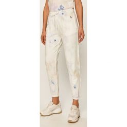 Polo Ralph Lauren - Spodnie. Białe spodnie damskie Polo Ralph Lauren, l, z bawełny. W wyprzedaży za 419,90 zł.