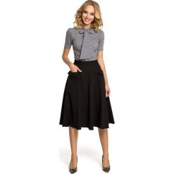 Czarna Spódnica Rozkloszowana Midi z Patkami przy Kieszeniach. Czarne spódniczki damskie Molly.pl, na co dzień, s, bez wzorów, klasyczne, długie, midi, rozkloszowane. Za 128,90 zł.