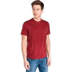 Armani Exchange Koszulka Czerwony. Czerwone podkoszulki męskie Armani Exchange, l, z nadrukiem, z bawełny, bez kołnierzyka, krótkie. Za 240,95 zł.