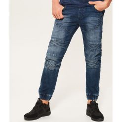 Denimowe joggery z biker panelami - Niebieski. Niebieskie bez kategorii House, m, z jeansu. W wyprzedaży za 49,99 zł.