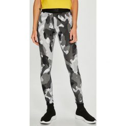 Nike Sportswear - Legginsy. Czarne legginsy damskie marki Nike Sportswear, s, z elastanu. W wyprzedaży za 119,90 zł.