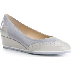 Buty damskie. Brązowe koturny damskie Wittchen. W wyprzedaży za 323,91 zł.