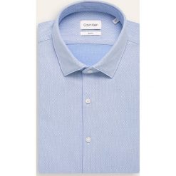 Calvin Klein - Koszula. Niebieskie koszule męskie Calvin Klein, m, bez wzorów, z bawełny, klasyczne, z klasycznym kołnierzykiem, z długim rękawem. W wyprzedaży za 249,90 zł.