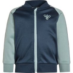 Hummel BABY LEO ZIP Kurtka sportowa blue wing teal. Niebieskie kurtki chłopięce marki Hummel, z bawełny. Za 149,00 zł.