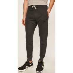 Reebok - Spodnie. Czarne spodnie męskie Reebok, s, z elastanu, sportowe. Za 179,90 zł.