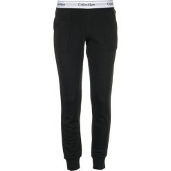 Calvin Klein spodnie dresowe damskie L czarny. Czarne jeansy damskie Calvin Klein, l. Za 289,00 zł.