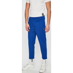 Ellesse - Spodnie. Niebieskie spodnie męskie Ellesse, na co dzień, xl, bez wzorów, z bawełny, casualowe. W wyprzedaży za 129,90 zł.