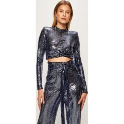 Marciano Guess - Bluzka. Niebieskie bluzki damskie MARCIANO GUESS, na co dzień, s, z aplikacjami, z elastanu, z okrągłym kołnierzem, z długim rękawem. W wyprzedaży za 379,90 zł.