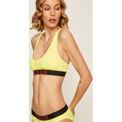 Calvin Klein - Biustonosz kąpielowy. Żółte stroje kąpielowe damskie Calvin Klein, s, z aplikacjami, z elastanu. W wyprzedaży za 199,90 zł.