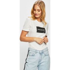 Calvin Klein Jeans - Top. Czarne bluzki damskie marki Calvin Klein Jeans, s, z nadrukiem, z bawełny, z okrągłym kołnierzem. Za 159,90 zł.