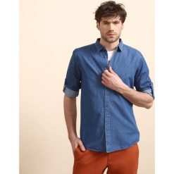 Koszula długi rękaw męska regular fit. Niebieskie koszule męskie Top Secret, na lato, m, bez wzorów, z bawełny, bez kołnierzyka, z długim rękawem. W wyprzedaży za 39,99 zł.
