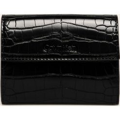 Calvin Klein - Portfel. Czarne portfele damskie Calvin Klein, bez wzorów, ze skóry ekologicznej. W wyprzedaży za 219,90 zł.