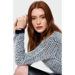 Miękki sweter o dopasowanym kroju. Swetry damskie Greenpoint, bez wzorów, z nylonu, bez rękawów, bez kaptura. Za 79,99 zł.