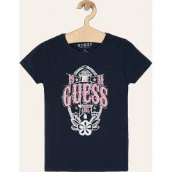 Guess Jeans - T-shirt dziecięcy 118-175 cm. Niebieskie bluzki dziewczęce Guess Jeans, z nadrukiem, z elastanu, z okrągłym kołnierzem, z krótkim rękawem, krótkie, bez kaptura. Za 89,90 zł.
