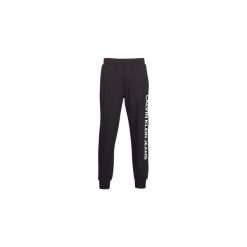Spodnie treningowe Calvin Klein Jeans INSTITUTIONAL SIDE LOGO JOGGING. Czarne spodnie męskie Calvin Klein Jeans, s, bez wzorów, z jeansu. Za 399,00 zł.