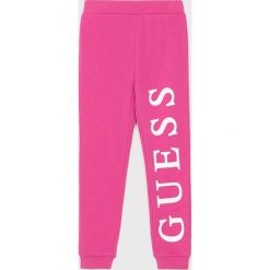 Guess Jeans - Legginsy dziecięce 118-166 cm. Czarne spodnie dziewczęce Guess Jeans, z nadrukiem, z elastanu. W wyprzedaży za 79,90 zł.